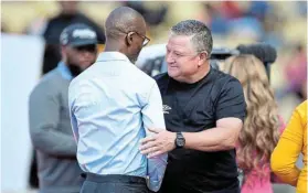  ?? Picture: LEFTY SHIVAMBU/GALLO IMAGES ?? SHAKING ON IT: SuperSport United coach Gavin Hunt and Kaizer Chiefs counterpar­t Arthur Zwane after SuperSport beat Chiefs at the Royal Bafokeng Stadium on Saturday