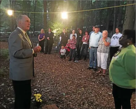  ?? PHOTOS BY KEVIN TUSTIN — DIGITAL FIRST MEDIA ?? State Rep. Stephen Barrar, R-160, of Upper Chichester, speaks to family members at Sunday evening’s vigil.