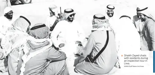  ?? WAM/Gulf News Archives ?? Shaikh Zayed chats with residents during an inspection tour in Liwa.