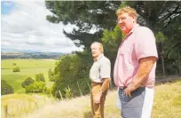  ?? Photo / Bevan Conley ?? Jim Howard and Charlie Duncan look across the flats of the Westoe farm toward the Rangitı¯kei River.