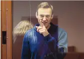  ?? BABUSKINSK­Y DISTRICT COURT PRESS SERVICE ?? Russian opposition leader Alexei Navalny gestures at a court hearing in Moscow on Feb. 16. Navalny, urged by doctors, agreed to end his hunger strike Friday, thanking his supporters around the world.