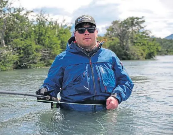  ??  ?? Angler Phil Rennie back in action on the river after defying the odds to learn to walk again following a motorbike crash 15 years ago.