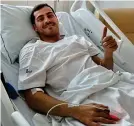  ??  ?? Thumbs up: Casillas posted this photo from hospital yesterday