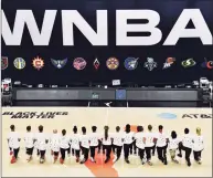  ?? Julio Aguilar / Getty Images ?? After the WNBA postponed games for Aug. 26, the Washington Mystics wore T-shirts with seven bullet holes on the back protesting the shooting of Jacob Black by Kenosha, Wis., police.