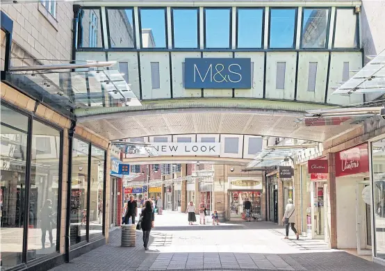  ?? PHOTOS BY THE NEW YORK TIMES ?? The Marks &amp; Spencer store in Stockton-on-Tees, England was one of the British retailer’s oldest branches. It closed in August.