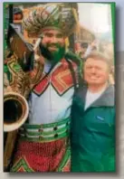  ?? PEG DEGRASSA – DIGITAL FIRST MEDIA ?? This photograph shows Delco costumer James May, right, with Eagles player Jason Kelce, wearing the Mummers hat that May designed and hand made 11 years ago, but which Kelce made famous by donning for the Eagles Super Bowl parade party.