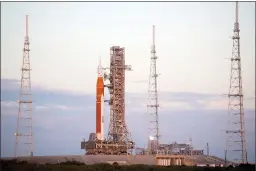  ?? Joel Kowsky via TNS ?? NASA’S Space Launch System (SLS) rocket with the Orion spacecraft aboard is seen atop the mobile launcher as it arrives at Launch Pad 39B, Friday, Nov. 4, 2022, at NASA’S Kennedy Space Center in Florida.