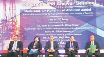  ??  ?? (From left) Permanent Secretary for Ministry of Urban Developmen­t and Natural Resources Dr Wan Lizozman Wan Omar, Permanent Secretary for Ministry of Utilities Sarawak Dato Ir Alice Jawan, Fong, Saau, and Lands and Survey Department Sarawak director...