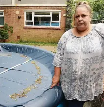  ??  ?? Defiant: Maria Young in garden with the pool