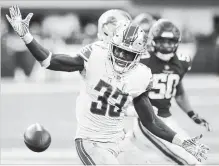  ?? JIM MONE THE ASSOCIATED PRESS ?? Detroit Lions running back Kerryon Johnson fumbles a pitch from Matthew Stafford during a game against the Minnesota Vikings, Sunday.