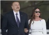  ?? —AP ?? BAKU: Azerbaijan’s President Ilham Aliyev and his wife Mehriban Aliyeva watch the last minutes of the Formula One Grand Prix of Europe at the Baku Circuit in this file photo.