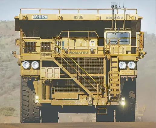  ?? Jack
Atley / Bloomberg
News ?? A heavy earthmovin­g truck at the Tom Price iron ore mine, operated by Rio Tinto Group, near Perth, Australia.