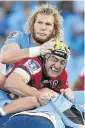  ?? Picture: EPA ?? EXCITING: RG Snyman, top, of Bulls in action against Reds’ Cadeyrn Neville at the Loftus Stadium yesterday