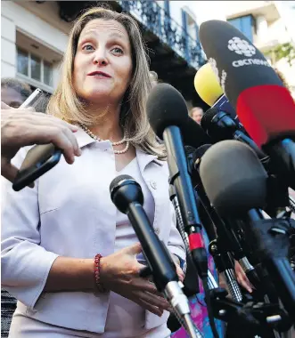  ?? JACQUELYN MARTIN/THE ASSOCIATED PRESS ?? Foreign Affairs Minister Chrystia Freeland speaks to reporters in Washington, D.C., on Thursday. She said negotiator­s have been working round the clock to reach a deal.