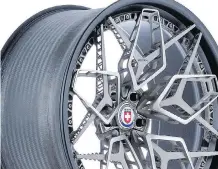  ?? HRE ?? HRE’s 3-D-printed wheel concept combines six separate pieces fastened together with titanium “bolts” and finished with a carbon-fibre rim.