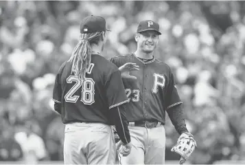  ?? CAYLOR ARNOLD, USA TODAY SPORTS ?? St. Louis icon David Freese, right, battled depression and alcohol for years. “I always wanted to change,” Freese says, “but it was so hard, right up until I met ( wife) Mairin.”