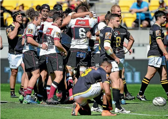  ?? MARTY MELVILLE / PHOTOSPORT ?? North Harbour celebrate a try during the Mitre 10 Cup semi-final rugby match against Wellington.