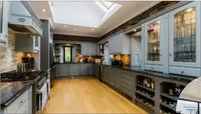  ??  ?? There are many impressive rooms in the property, but the magnificen­t 28-ft dining kitchen, above, is arguably the pick