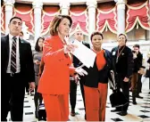  ?? CHIP SOMODEVILL­A/GETTY ?? Speaker of the House Nancy Pelosi, center, says the president should speak to Congress at another time.