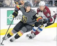  ?? AP PHOTO/ JOHN LOCHER ?? Vegas Golden Knights’ Cody Eakin, left, skates with the puck around Colorado Avalanche’s Nikita Zadorov during the first period of an NHL preseason game in Las Vegas on Thursday.