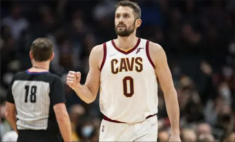  ?? Associated Press ?? Kevin Love scored 22 of his 25 points in the second half and made two free throws with 1.2 seconds left in the Cavaliers’ 102-101 win over the Hornets.