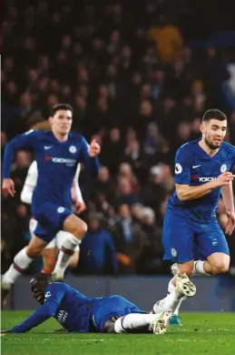  ??  ?? Top and bottom
Martinelli proved he’s a boy for the big occasion by racing through to score at Chelsea