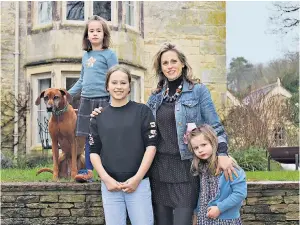  ??  ?? Nancy Parker with Birdy, Cecily and Georgia, and dog Malo, at home in Gloucester­shire