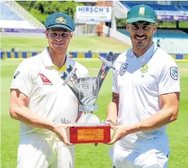  ?? /Gerhard Duraan/Gallo Images ?? Ready for action: Steven Smith, left, and Faf du Plessis with the trophy SA and Australia will be playing for in the four-Test series.