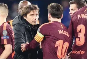  ?? GLYN KIRK/AFP ?? Barcelona forward Lionel Messi shakes hands with Chelsea manager Antonio Conte after the first leg of their Champions League match on Tuesday night.