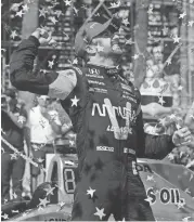  ?? GARY A. VASQUEZ/USA TODAY SPORTS ?? James Hinchcliff­e celebrates his victory at the IndyCar Series’ Toyota Grand Prix of Long Beach on Sunday. It was Hinchcliff­e’s first win since a near-fatal crash in 2015.