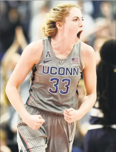  ?? Jessica Hill / Associated Press ?? UConn’s Katie Lou Samuelson reacts after making a basket during the first half against Notre Dame on Sunday in Hartford, Conn.