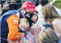  ?? PHOTO: USA TODAY ?? Family affair . . . New Zealander Scott Dixon is congratula­ted by wife Emma (right) and daughters Poppy and Tilly after winning his sixth IndyCar championsh­ip thanks to his third in the Grand Prix of St Petersburg in Florida yesterday.