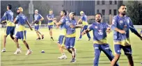  ??  ?? Chennai Super Kings players during a training session on Friday
