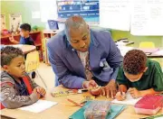  ?? [PHOTO BY JIM BECKEL, THE OKLAHOMAN] ?? Kindergart­en teacher Harold Smith at Green Pastures is one of over 1,800 emergency certified teachers in Oklahoma this year. State education leaders want to reduce that number by 95 percent by 2025.