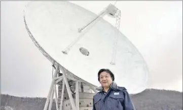  ?? — Yomiuri Shimbun photo ?? Standing in front of the giant antenna that will be retired in three years in Saku, Nagano Prefecture, Japan, head of the center Zenichi Yamamoto says, “Without this, we could not have had a second chance with the Venus probe Akatsuki.”