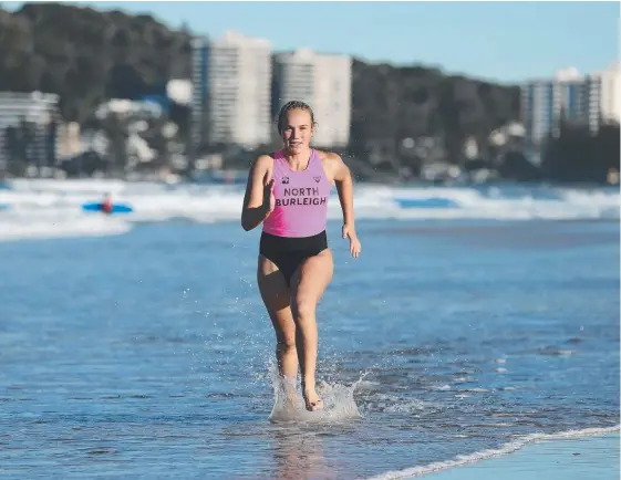  ?? Picture: GLENN HAMPSON ?? Caitlyn Mackney, 14, began her life saving career as a Nipper and knows full well the program’s importance.