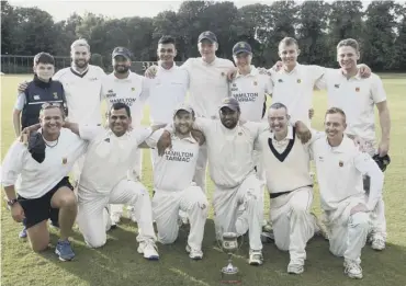  ??  ?? The Prestwick team pose with their trophy after winning last season’s National League final