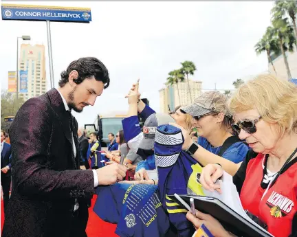  ?? MIKE EHRMANN/GETTY IMAGES ?? The Jets’ Connor Hellebuyck finds himself among the NHL leaders this season in wins, shutouts and save percentage.