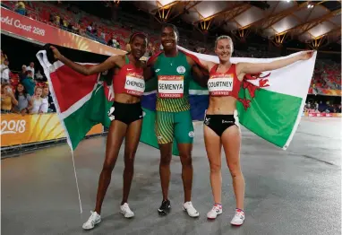  ?? REUTERS ?? TOP PERFORMERS: Gold medallist Caster Semenya of South Africa, silver medallist Beatrice Chepkoech of Kenya and bronze medallist Melissa Courtney of Wales pose for photos after their 1500m final yesterday.