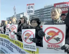  ?? AHN YOUNG-JOON/THE ASSOCIATED PRESS ?? South Koreans protest the joint South Korea-U.S. air force exercises, near the U.S. Embassy in Seoul, South Korea, on Monday.