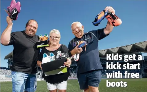  ?? Picture: PETER RISTEVSKI ?? LEGACY: Paul, Cath and Bob West with footy boots donated to kids in need.