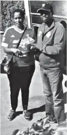  ??  ?? Highlander­s welfare manager Vezigama Dlodlo receives part of the Deep Freez Cold Sprays from the Bosso Tshilamoya Chapter representa­tive Fisnoliah Nolie Dube at the club offices on Monday