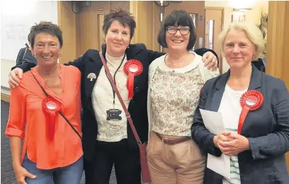  ??  ?? ●● All smiles for council leader Alyson Barnes (right) and Labour councillor­s and supporters