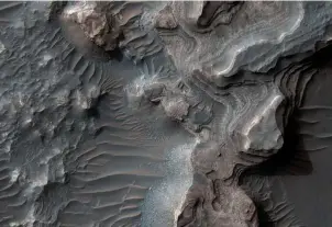  ??  ?? An aerial image – taken by the Mars Reconnaiss­ance Orbiter – of Mars’s Uzboi Vallis, believed to have been formed by running water