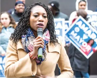  ?? JAMES FOSTER/FOR THE SUN-TIMES ?? Mayoral candidate Amara Enyia rallies supporters in Daley Plaza on Monday.