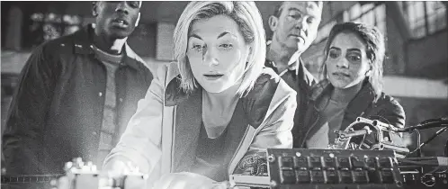  ?? SOPHIE MUTEVELIAN
BBC ?? Jodie Whittaker, centre, is the first woman in the 55-year history of “Doctor Who” to play the Doctor.