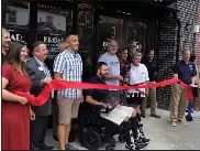  ?? BOB KEELER - MEDIANEWS GROUP ?? A group including, from left, Souderton Connects Business Improvemen­t District Coordinato­r Liz Peitzman; Scott Little; Souderton Borough Council President Brian Goshow; Broad Theater co-owners Kyle Hoff and Charles Crown; Dominic Capece and Janice Kenworthy of Free Will Brewing; and Indian Valley Chamber of Commerce Executive Director Steven Hunsberger prepare for the July 29 ribbon-cutting.