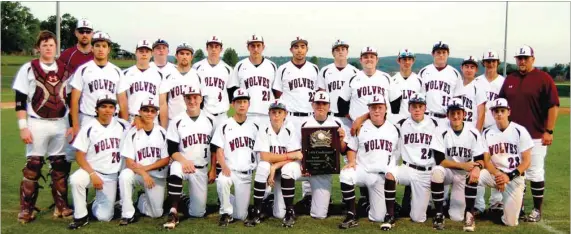  ?? BEN MADRID ENTERPRISE-LEADER ?? The Lincoln baseball team captured the 4A-1 District tournament championsh­ip behind a dominating pitching performanc­e from junior pitcher Drew Harris. The Wolves beat Prairie Grove, 7-0 on May 5 on the Tigers’ home field to claim the title. Lincoln...