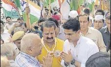  ?? HT PHOTO ?? State Congress president Sachin Pilot meets people during ‘booth jitao bhrashtach­ar mitao’ programme in Jaipur on Sunday.