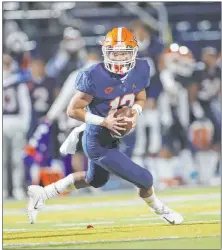  ?? Erik Verduzco Las Vegas Review-journal @Erik_verduzco ?? Bishop Gorman freshman quarterbac­k Micah Alejado threw for 228 yards and four TDS Friday in the win against Faith Lutheran.